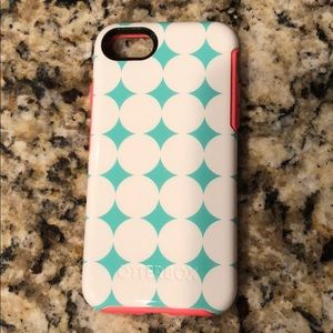 Teal with white dots Otterbox case for iPhone 8.